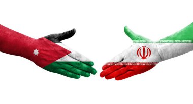 İran ve Ürdün bayrakları arasındaki el sıkışma ellerinde resmedilmiş şeffaf bir görüntü.