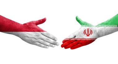 İran ve Monako bayrakları arasındaki el sıkışma, izole edilmiş şeffaf görüntü.