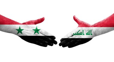 Irak ve Suriye bayrakları arasında el sıkışma, izole şeffaf görüntü.