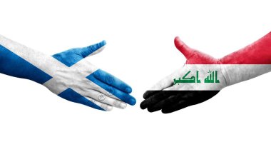 Irak ve İskoçya bayrakları arasında el sıkışma, izole şeffaf görüntü.