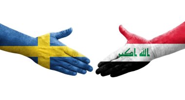 Irak ve İsveç bayrakları arasında el sıkışma, izole şeffaf görüntü.