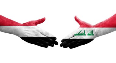 Irak ve Yemen bayrakları arasında el sıkışma, izole şeffaf görüntü.