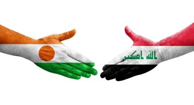 Irak ve Nijer bayrakları arasında el sıkışma, izole şeffaf görüntü.