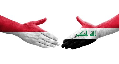 Irak ve Monako bayrakları arasındaki el sıkışma, izole edilmiş şeffaf görüntü.