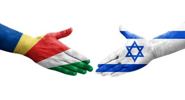 İsrail ve Seyşeller arasındaki el sıkışma ellerinde bayraklar, yalıtılmış şeffaf görüntü.