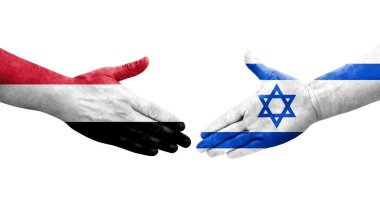 İsrail ve Yemen bayrakları arasında el sıkışma, izole şeffaf görüntü.