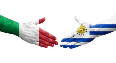 İtalya ve Uruguay bayrakları arasındaki el sıkışma, izole şeffaf görüntü.