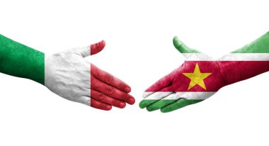 İtalya ile Surinam bayrakları arasındaki el sıkışma, izole edilmiş şeffaf görüntü.
