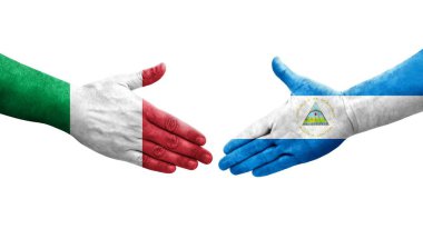 İtalya ve Nikaragua bayrakları arasında el sıkışma, izole şeffaf görüntü.