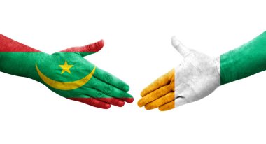 Fildişi Sahilleri ve Moritanya bayrakları arasındaki el sıkışma, izole şeffaf görüntü.