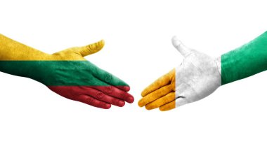 Fildişi Sahilleri ve Litvanya bayrakları arasındaki el sıkışma, izole şeffaf görüntü.