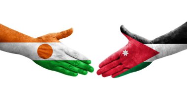 Ellerinde Jordan ve Nijer bayrakları arasında el sıkışma, izole şeffaf görüntü.