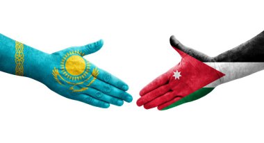 Ürdün ve Kazakistan bayrakları arasındaki el sıkışma ellere boyanmış, izole şeffaf görüntü.