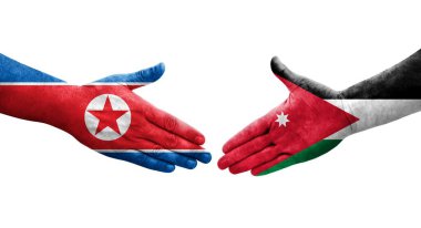 Ürdün ve Kuzey Kore bayrakları arasında el sıkışma..