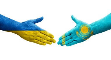 Kazakistan ve Ukrayna bayrakları arasındaki el sıkışma, izole şeffaf görüntü.
