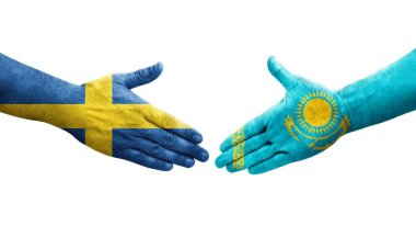 Kazakistan ve İsveç bayrakları arasındaki el sıkışma, izole şeffaf görüntü.