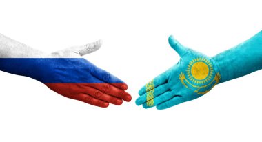 Kazakistan ve Rusya arasındaki el sıkışma ellerinde bayraklar, izole şeffaf görüntü.