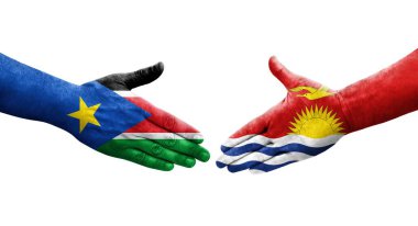 Kiribati ve Güney Sudan bayrakları arasındaki el sıkışma, izole şeffaf görüntü.