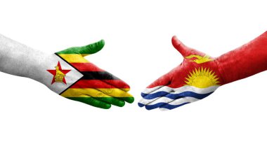 Ellerinde Kiribati ve Zimbabwe bayrakları arasında el sıkışma, izole şeffaf görüntü.