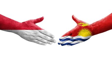 Ellerinde Kiribati ve Monako bayrakları arasında el sıkışma, izole şeffaf görüntü.