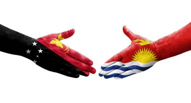 Kiribati ve Papua Yeni Gine bayrakları arasındaki el sıkışma, izole şeffaf görüntü.