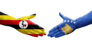 Kosova ile Uganda bayrakları arasındaki el sıkışma, izole edilmiş şeffaf görüntü.