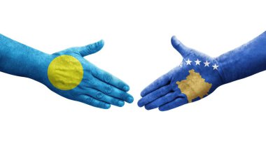 Kosova ile Palau bayrakları arasındaki el sıkışma, izole edilmiş şeffaf görüntü.