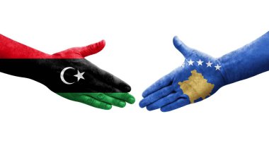 Kosova ile Libya bayrakları arasındaki el sıkışma, izole edilmiş şeffaf görüntü.