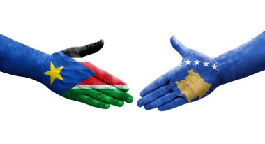 Kosova ile Güney Sudan bayrakları arasındaki el sıkışma, izole edilmiş şeffaf görüntü.