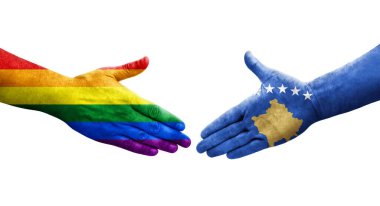 Kosova ile LGBT bayrakları arasındaki el sıkışma, izole edilmiş şeffaf görüntü.