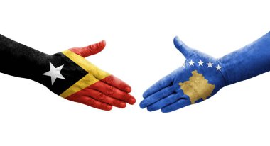 Kosova ile Timor Leste bayrakları arasındaki el sıkışma, izole edilmiş şeffaf görüntü.