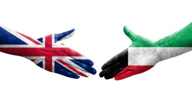 Kuveyt ile Birleşik Krallık bayrakları arasındaki el sıkışma, izole saydam görüntü.