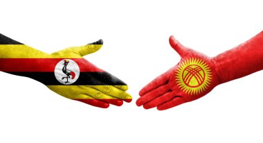 Kırgızistan ve Uganda bayrakları arasındaki el sıkışma, izole şeffaf görüntü.