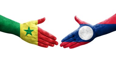 Laos ve Senegal bayrakları arasındaki el sıkışma, izole edilmiş şeffaf görüntü.