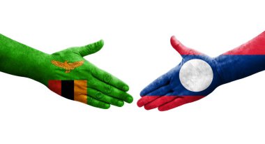 Ellerinde Laos ve Zambiya bayrakları arasında el sıkışma, izole şeffaf görüntü.