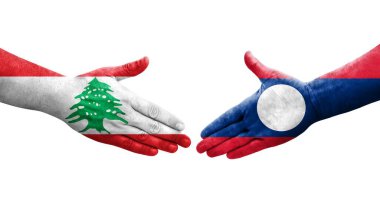 Laos ve Lübnan bayrakları arasındaki el sıkışma ellerinde resmedilmiş şeffaf görüntü.