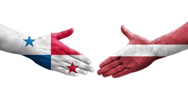 Ellerinde Letonya ve Panama bayrakları arasında el sıkışma, izole şeffaf görüntü.