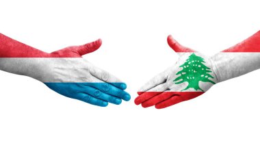 Lübnan ve Lüksemburg bayrakları arasında el sıkışma, izole şeffaf görüntü.