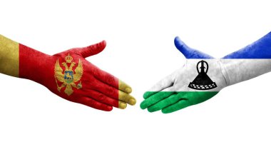 Lesotho ve Karadağ bayrakları arasındaki el sıkışma, izole şeffaf görüntü.