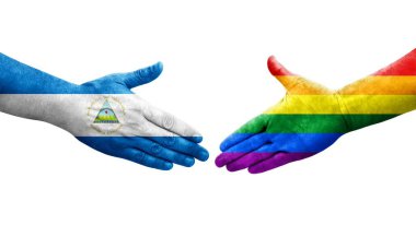 LGBT ve Nikaragua bayrakları arasında el sıkışma, izole şeffaf resim.