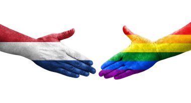 LGBT ve Hollanda bayrakları arasındaki el sıkışma, izole şeffaf resim.