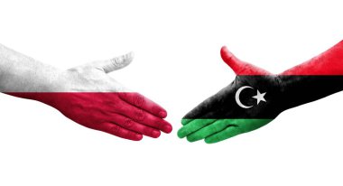 Libya ve Polonya arasındaki el sıkışma ellerinde bayraklar, izole edilmiş şeffaf görüntü.