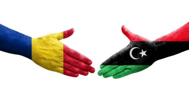 Libya ve Romanya bayrakları arasındaki el sıkışma, izole edilmiş şeffaf görüntü.