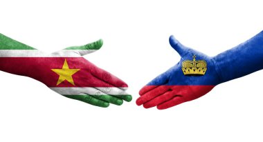 Lihtenştayn ve Surinam bayrakları arasındaki el sıkışma, izole şeffaf görüntü.