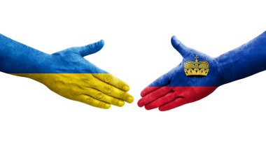 Lihtenştayn ve Ukrayna bayrakları arasındaki el sıkışma, izole şeffaf görüntü.