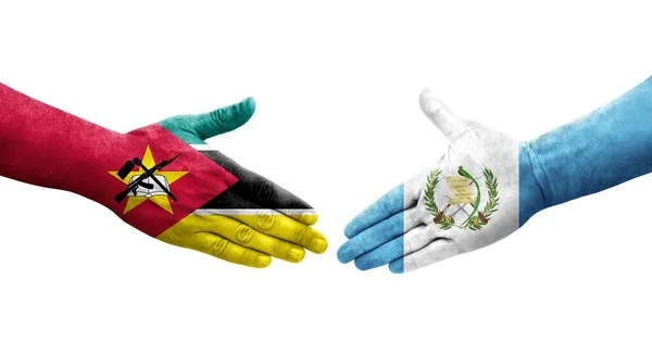 Χειραψία Μεταξύ Γουατεμάλας Και Μοζαμβίκης Σημαίες Ζωγραφισμένα Στα Χέρια Απομονωμένη — Φωτογραφία Αρχείου