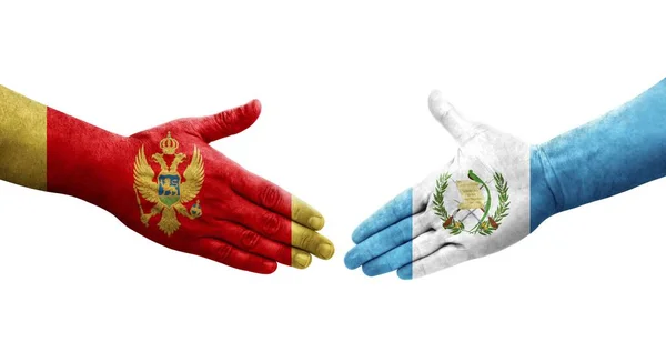 Рукостискання Між Гватемальськими Чорногорськими Прапорами Намальоване Руках Ізольоване Прозоре Зображення — стокове фото
