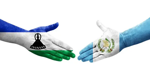 Рукостискання Між Гватемала Лесото Прапори Намальовані Руках Ізольований Прозорий Образ — стокове фото
