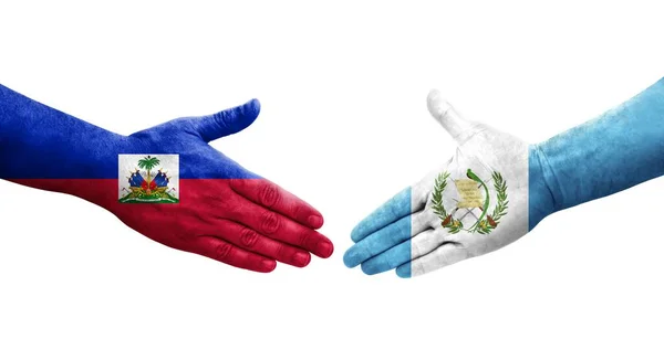 Χειραψία Μεταξύ Γουατεμάλας Και Της Αϊτής Σημαίες Ζωγραφισμένα Στα Χέρια — Φωτογραφία Αρχείου
