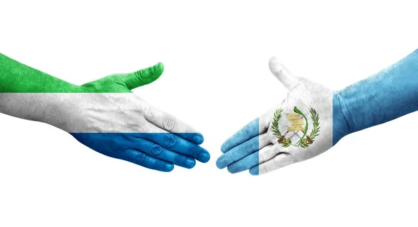 Рукопожатие Между Флагами Гватемалы Сьерра Леоне Нарисованное Руках Изолированное Прозрачное — стоковое фото